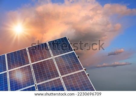 Photo collage of sunset and solar panel, photovoltaic, alternative electricity source - concept of sustainable resources