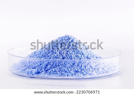 blue Fluorescent pigments, made up of a polymeric matrix, resins of different types such as polyester, alkyd, formaldehyde which are fused with organic dyes. Royalty-Free Stock Photo #2230706971