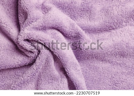 Soft crumpled pale purple towel as background, top view Royalty-Free Stock Photo #2230707519