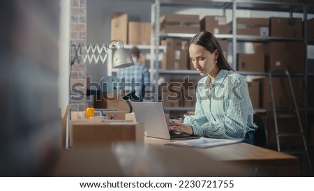 Online Store Inventory Manager Using Laptop Computer, Preparing a Small Parcel for Postage. Young Confident Small Business Owner Working in Storeroom, Preparing Order for Client. Royalty-Free Stock Photo #2230721755