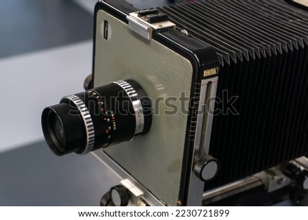 The old lens. Format camera. Cardan camera. Analog camera. Shooting on film or on paper. Retro camera close up
