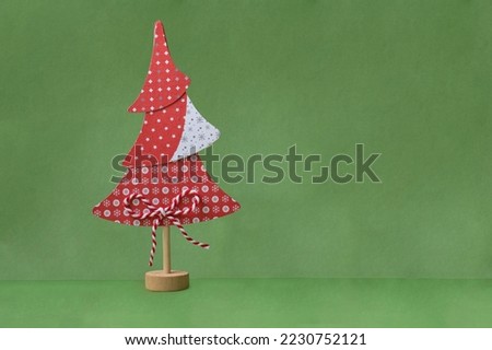 decorated christmas tree with green background
