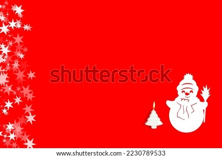 Snowman made of paper with a three-dimensional white Christmas tree and decorative stars. Christmas and New Year concept, with copy space.