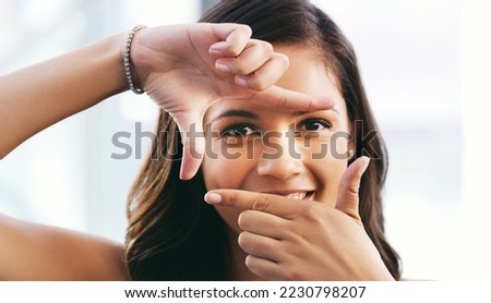 Portrait, hand and frame in studio for photography, and creative vision or ambition on white background, Hands, finger and border with face of girl photographer, direct and picture perfect mockup