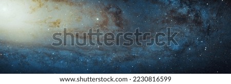 Panoramic view of the  Andromeda galaxy constellation  in outer space. Showing millions of stars and star clusters.  Digitally enhanced. Elements of this image furnished by NASA.