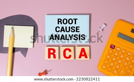 ROOT CAUSE ANALYSIS text on paper with calculator, notepad, coffee ,pen with graph. Royalty-Free Stock Photo #2230822411