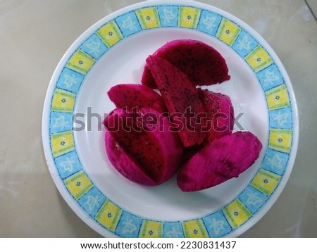 Slices of dragon fruit served on plate