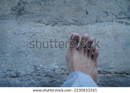 southeast asian male toes in indonesia