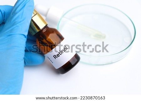 Retinol in a bottle, chemical ingredient in beauty product, skin care products Royalty-Free Stock Photo #2230870163