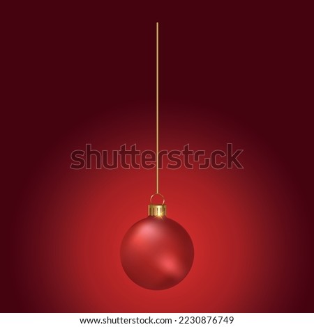 Christmas toy - red ball on a gold thread