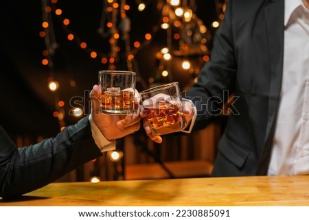 whiskey, for a friendly party in a bar or a restaurant. Royalty-Free Stock Photo #2230885091