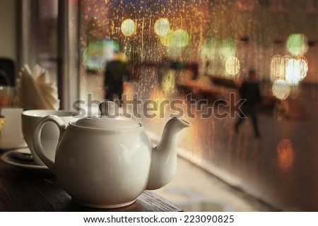 tea in the cafe showcase city Royalty-Free Stock Photo #223090825