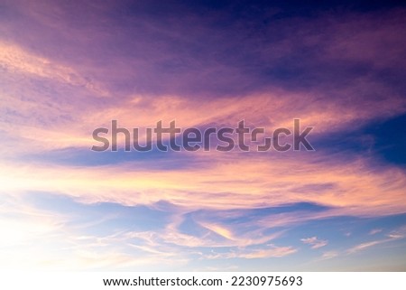 Sunset with clouds on the mountains.The sunset gives pass through the clouds late evening. Ray of the sunset with sky background. Beautiful sun beam pass through the cloud. Beautiful sky. Royalty-Free Stock Photo #2230975693