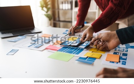 Best Designers for Your UX Team working in office, start up people working as overall layout, typography, patterns, iconography. Royalty-Free Stock Photo #2230976445