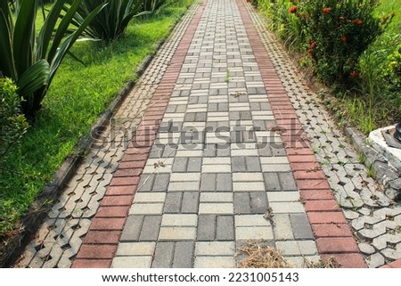the path in the garden is made of adobe