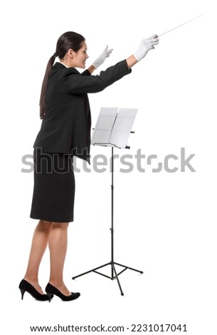 Professional conductor with baton and note stand on white background