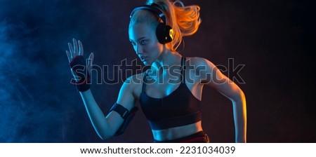 Fit woman on black background with neon lights. Fitness and sport motivation. Download banner for sports website or mobile application.