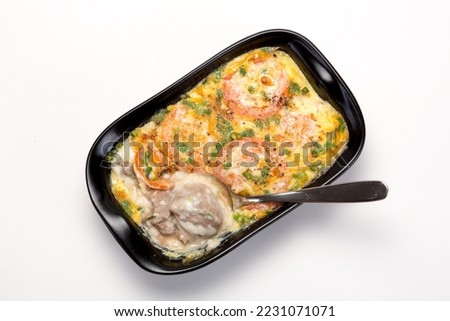 Dabba gosht

(Coming from the Bohra community is a succulent, melt in the mouth mutton delicacy in a white sauce topped with eggs and baked to perfection)

 Royalty-Free Stock Photo #2231071071