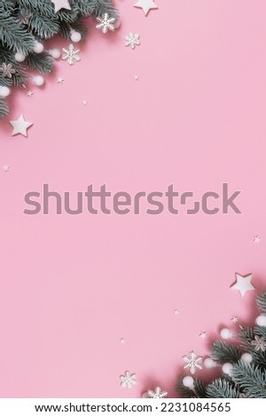 Christmas New Year decoration top view, flat lay on pink background with copy space.