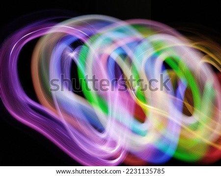 Neon light lines futuristic abstract colour splash photography with low shutter speed 
