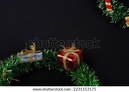 Christmas deer decorates a Christmas tree.