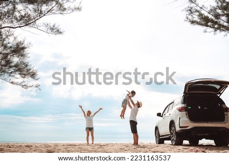 Happy Family with car travel road trip. summer vacation in car in the sunset, Dad, mom and daughter happy traveling enjoy together driving in holidays, people lifestyle ride by automobile. Royalty-Free Stock Photo #2231163537