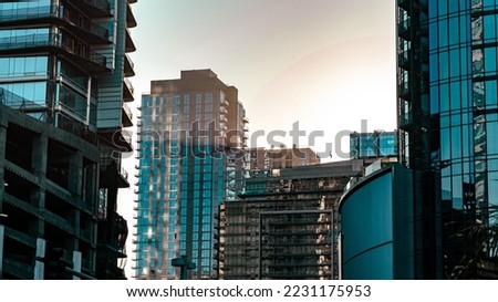 City skyscrapers in the dawn sunlight