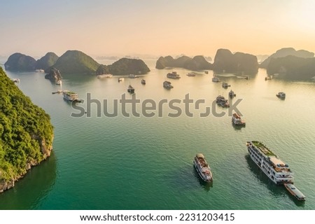 Floating fishing village, rock island, Halong Bay, Vietnam. Junk boat cruise to Ha Long Bay. Destinations for tourists from Thailand, Korea, America, Thailand, Japan, European are relax