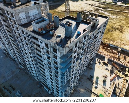 Monolithic frame construction of the building. Solid walls of concrete. Shooting from a drone. Modern construction of a residential building. construction site close up