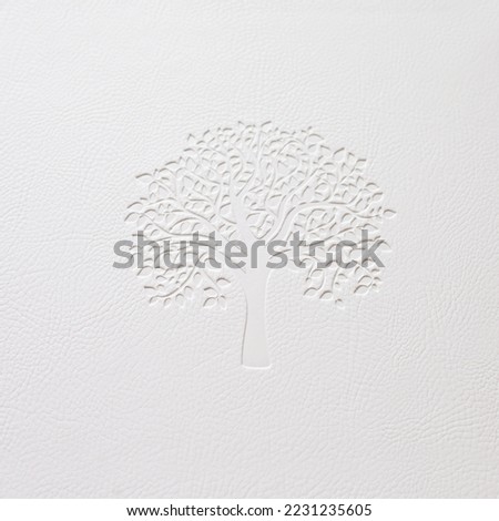 Abstract luxury  leather texture for background. White  leather with elegant tree embossing for work design or backdrop product.