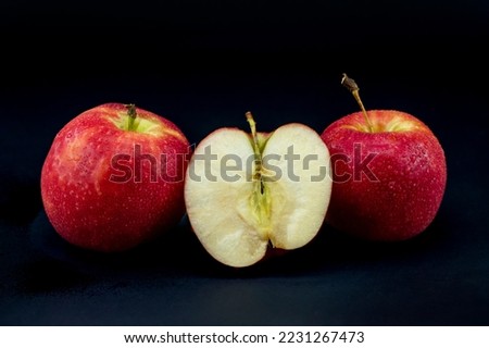 close-up apple on black background