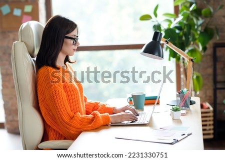 Profile side photo of responsible serious lawyer attorney financier economist editor typing sms message workplace indoors