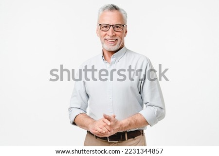 Happy mature middle-aged senior businessman teacher grandfather freelancer college professor wearing glasses isolated in white background