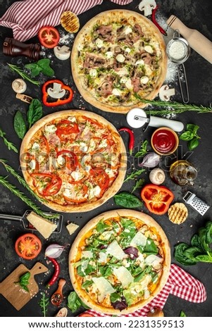 Set Pizza background. various kinds of Italian pizza on a dark background, Fast food lunch, vertical image. top view. place for text,