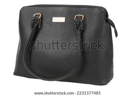 Black women's bag with textured leather, close-up, on a white background, isolate