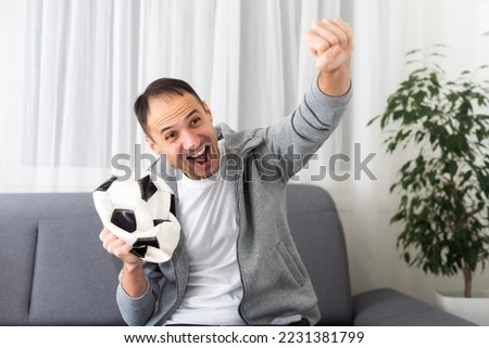 Fan Sport Player celebrating on background 