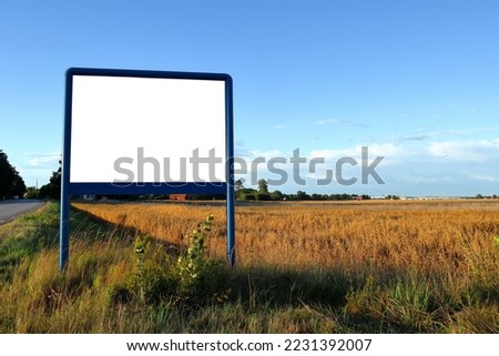 Large blank sign. Copy space for your text. Swedish countryside with meadow one summer day. Sweden, Scandinavia, Europe