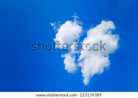 Clouds like broken heart on blue-sky