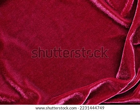 Red velvet fabric texture used as background. Empty red fabric background of soft and smooth textile material. There is space for text. Royalty-Free Stock Photo #2231444749