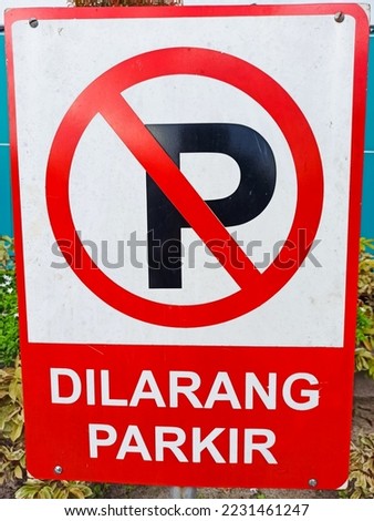 No parking or Dilarang parkir sign at an indonesian local hospital