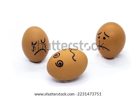 A crying egg, a worried egg and a dizzy egg