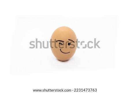 
An egg winking in White background