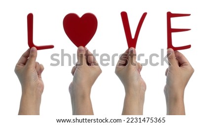 Hand holding word love on white background