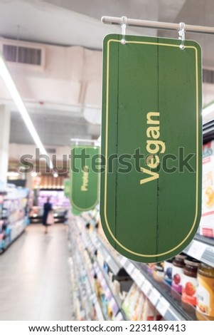 Signage word of Vegan food in supermarket grocery aisle