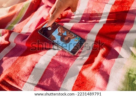 Hand, phone and selfie by friends at a beach for travel, fun and picture on towel, finger and screen. Women, hands and social media influencer set timer for recording, content creator and smartphone