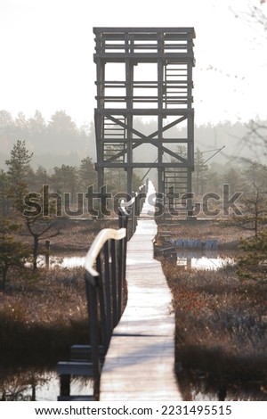 Wooden Watchtower in Misty Männikjärve Bog, Jõgeva County, Estonia Royalty-Free Stock Photo #2231495515