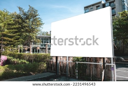 Large white blank billboard mockup displayed on the front of a restaurant. clipping path