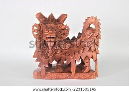 Balinese Handmade Barong Wooden Sculpture, Wood Carving, Sculpture, Art from Bali Indonesia Royalty-Free Stock Photo #2231505145