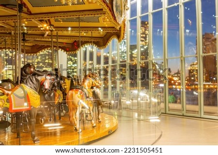 Sunset of the Brooklyn Bridge and Jane's Carousel at New York Royalty-Free Stock Photo #2231505451