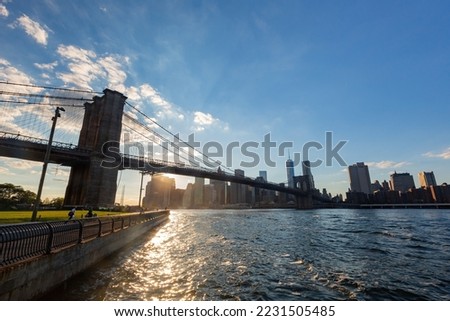 Sunset of the Brooklyn Bridge and New York City skyline at New York